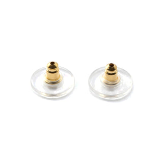 Spare pair of gold earring backs with clear discs