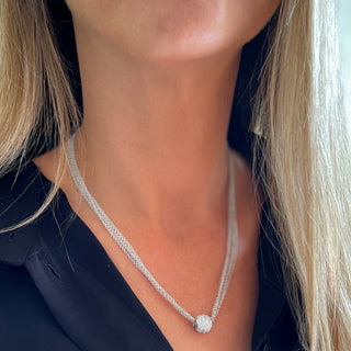 Model wearing Valora Silver Necklace, detail view