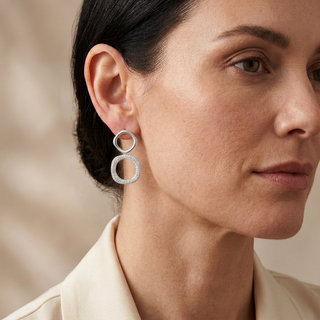 Model wearing Caia Silver Earrings