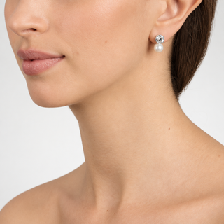 Colour model image wearing Mimi silver post earrings