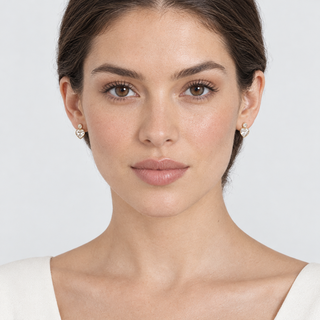 Full-face model wearing Posy Simple Gold Earrings