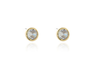 A pair of gold-plated round earrings with a clear, multifaceted CZ setting.