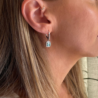 model wearing cz aquamarine drop earrings 