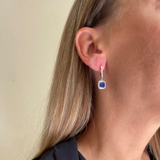 model wearing CZ tanzanite drop earrings 