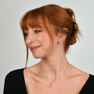Lara model portrait with silver earrings and necklace