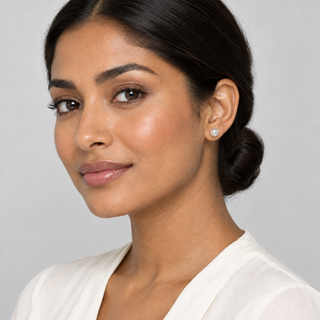 Model wearing a pearl stud reduced by 10%