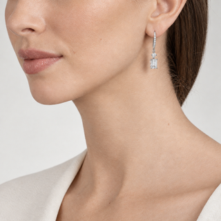 Model wearing Lani silver earrings