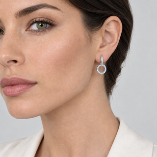 Model wearing Lara Drop earrings in silver