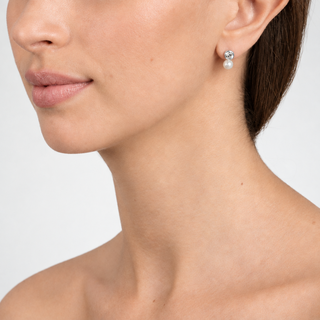 Model wearing petite Moma silver post earrings