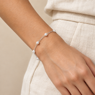 Model wearing the silver Pekoe pearl bracelet