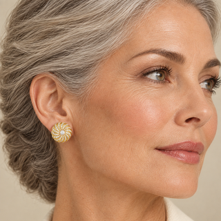 Older elegant model wearing Rimon Gold Clip On Earrings