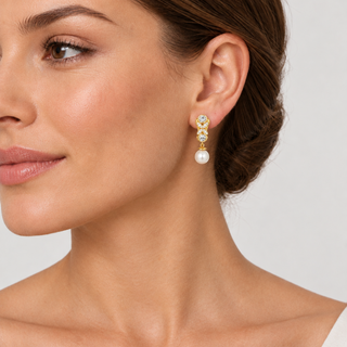 Model wearing Petra Gold Clip On Earrings