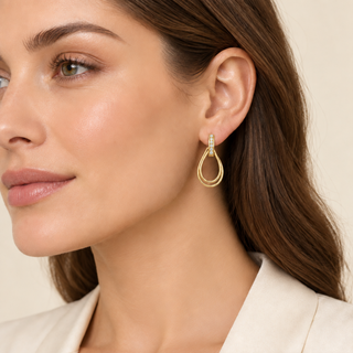 Qiao Gold Earrings model image with smaller earrings
