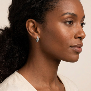 Model wearing Ricci Silver Hoop Earrings
