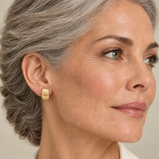 Model wearing Robbin Gold Clip On Earrings