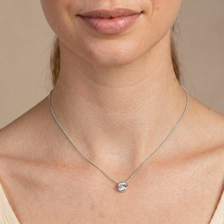 Model wearing Solitaire Silver Pendant