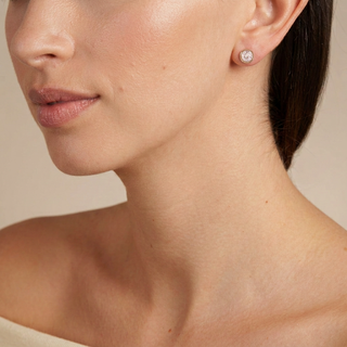 Model wearing Thisbe Vintage Rose Gold Earrings, pink crystal studs